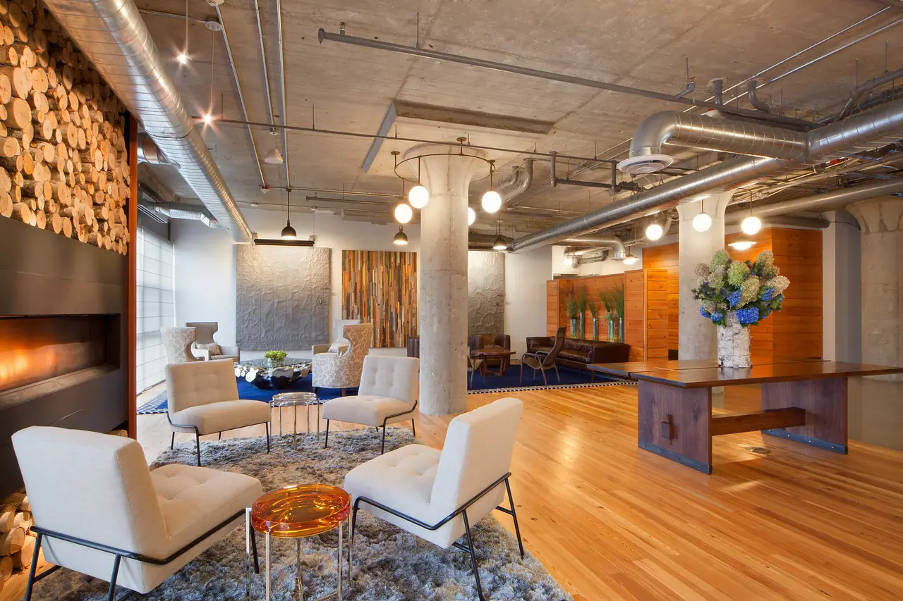 Commercial lobby furnished with urban wood pieces