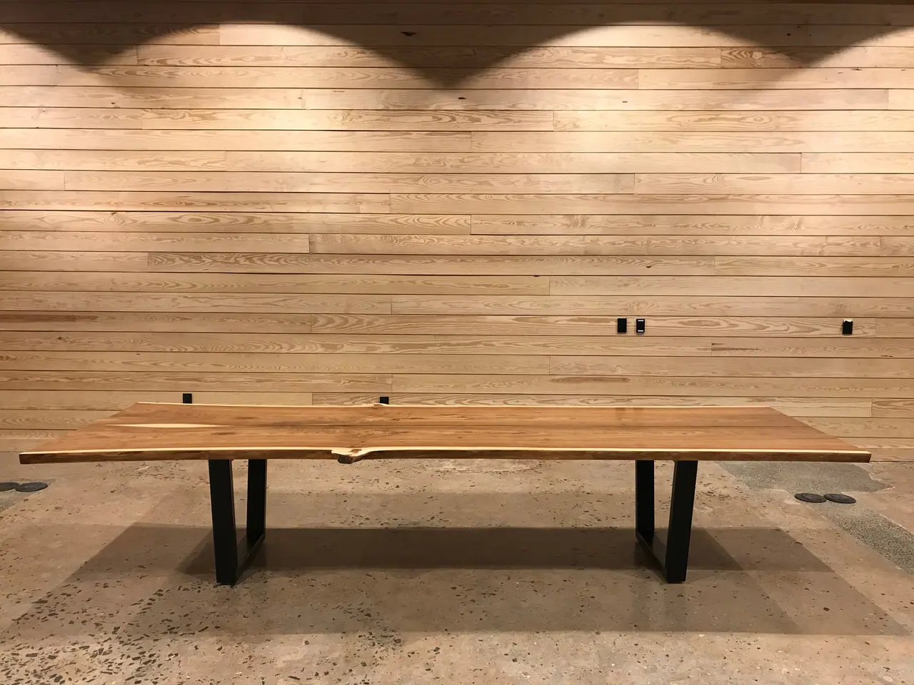 Salvaged red elm conference table at Firehouse 12